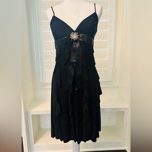 Black Ruffle Cocktail Dress with Rhinestone Brooch